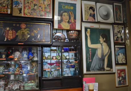 There are many rare old posters in the store.